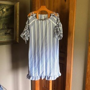 Peek a boo shoulder boutique dress.